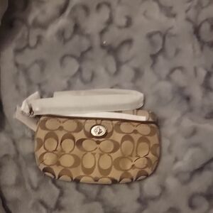 Coach Tan Clutch Signature Design